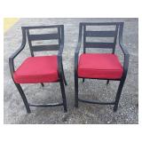 2 metal framed patio bar stools w/ red cushions