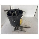 Black pail with contents