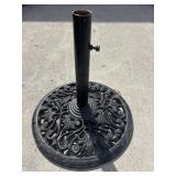 Black metal patio umbrella stand