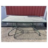 Glass top patio table