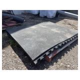 Six black rubber mats