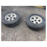 Two tires with rims: P245/75R16