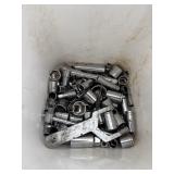 White pail of sockets, misc