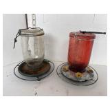 2 glass top bird feeders