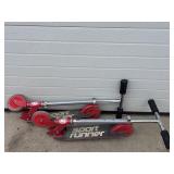 2 red sport runner scooters