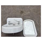 White cast sink and mirror