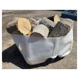 White tote of firewood