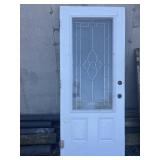 White door with decorative privacy window