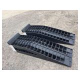 2 black plastic car ramps
