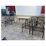 Glass top patio table and 6 chairs