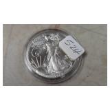 American Silver Eagle .999  - see photo for date