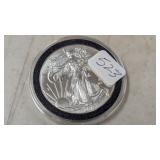 American Silver Eagle .999  - see photo for date