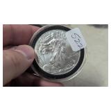 American Silver Eagle .999  - see photo for date