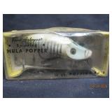 Hula Popper fishing plug
