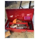 Red metal toolbox with assorted hand tools