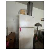 White top-freezer refrigerator