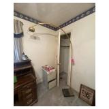 Brass arc floor lamp with weighted base