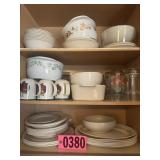 Shelf contents: dishware set including bowls,