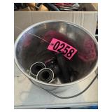 Metal bucket with rubber bike handles and chrome