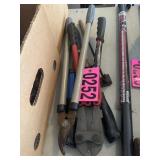 Assorted hedge trimmers and branding iron