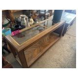 Glass top and wood coffee table