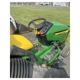 John Deere X300 mower w/ 42' deck and bagger, 295
