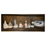 Shelf of mini lighthouse colletibles