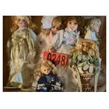 (6) Assorted porcelain dolls
