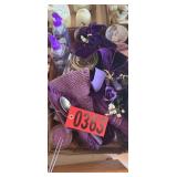 Purple kitchen cutlery, soap and candles
