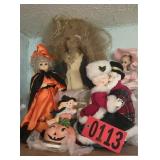 Shelf of dolls and figurines