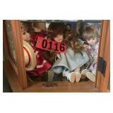 Shelf of dolls and figurines