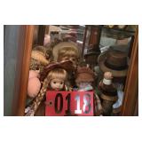 Shelf of dolls and figurines