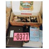 Box of buttons, travel charger