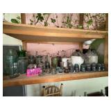 Contents of shelf - glass insulators, crocks,