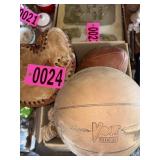 Box of vintage baseball gloves, football,