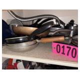 Contents of shelf - asst pots and pans
