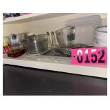 Contents of shelf - asst dishware