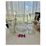 Three assorted clear glass vases