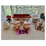 Assorted floral and garden decor including