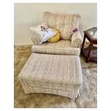 Upholstered armchair with matching ottoman and