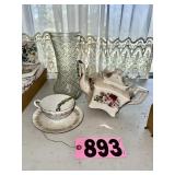 Floral teapot, teacup and saucer, glass vase, and