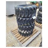 New/Unused Set of 4 12-16.5 SKS1 Skid Steer Tires