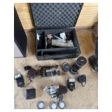 Camera and assorted attachments, Hard case