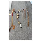 Walking sticks, boat and arrow and Native