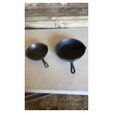 2 cast-iron pans