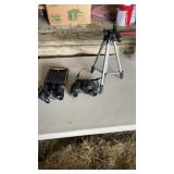 Camera tripod, two pairs of binoculars consort