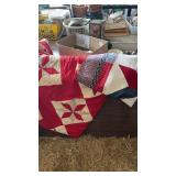 Two quilts towels, and fancy work quilts have