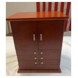 Wood jewelry box with several compartments