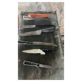 Kitchen utensils, lard tins, old plates, knives