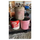 Metal gas can and lard tins.